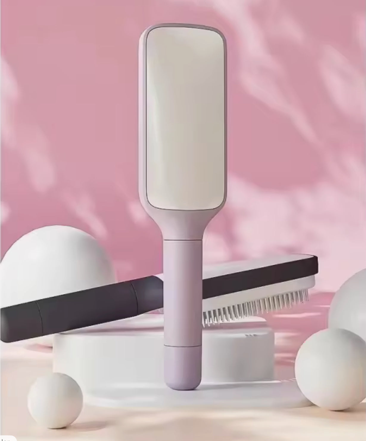 Rotating and Self cleaning hair comb