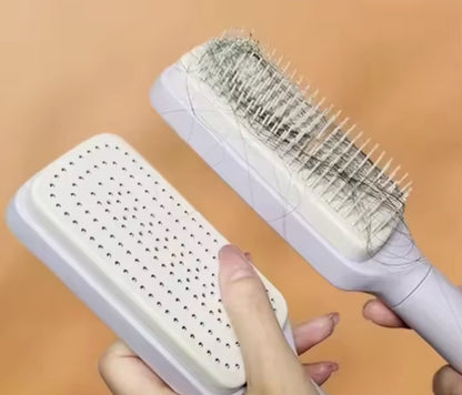 Rotating and Self cleaning hair comb